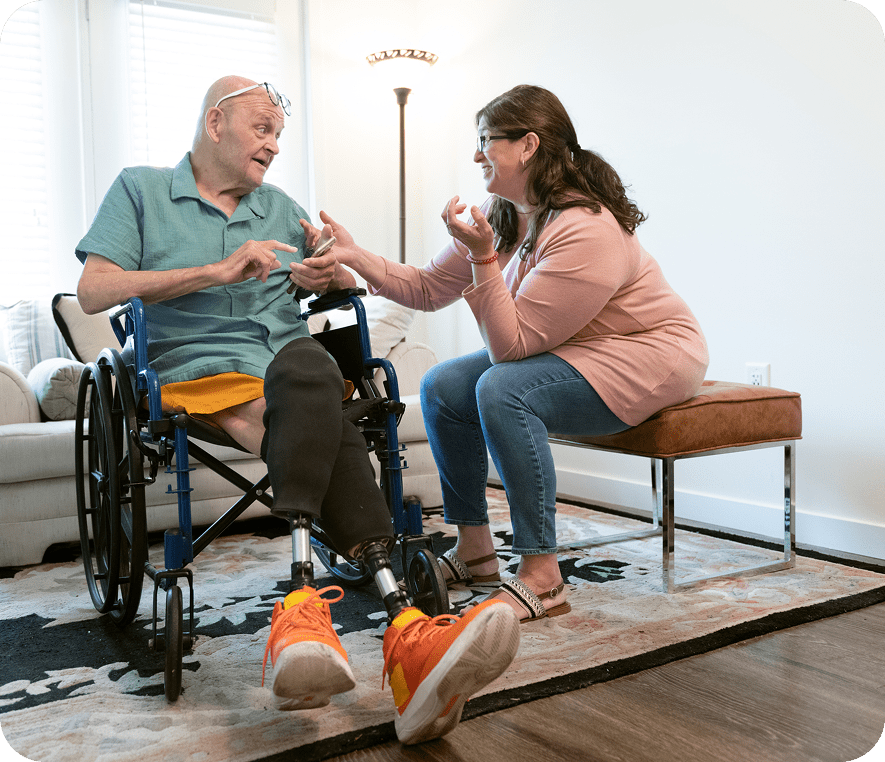 Senior and woman having a friendly conversation